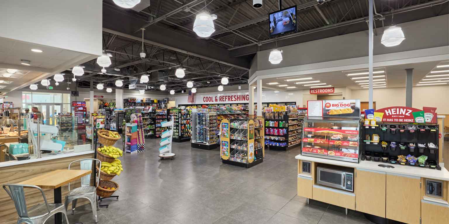 Inside Pilot travel center with shelves stocked with food and other products.